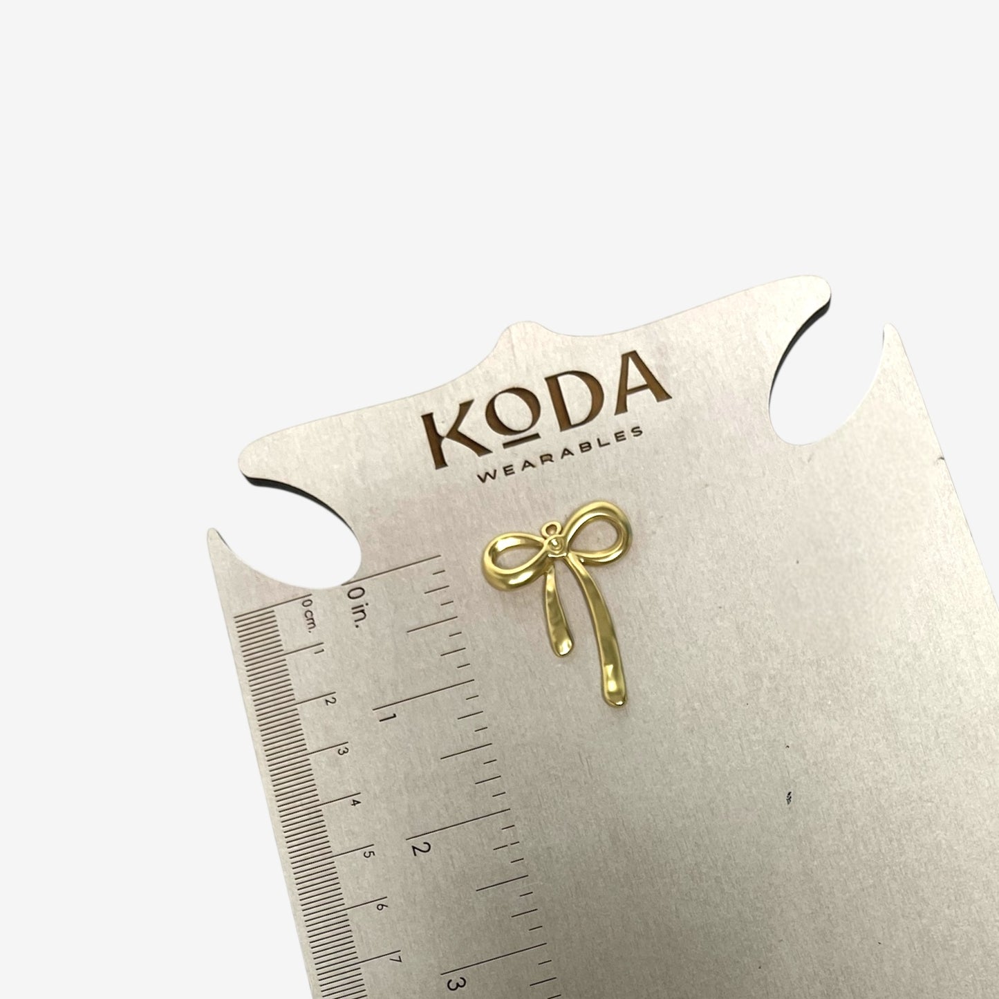 Golden Bow charm